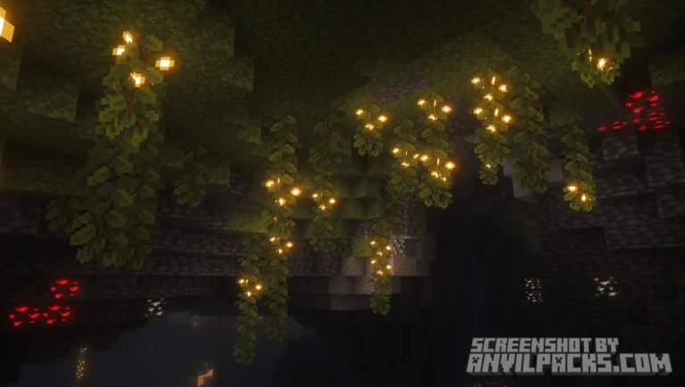 Lush cave interior featuring glowing berries hanging from the ceiling and illuminating the cave.