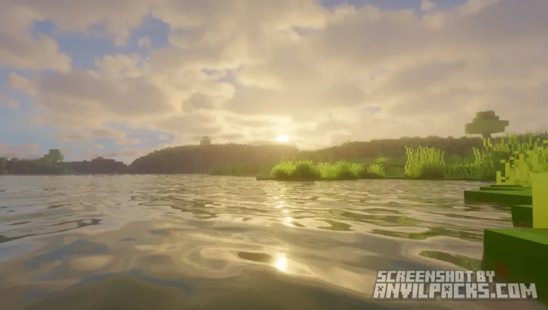 Sunset landscape over a lake with detailed water ripples and sun reflections on the surface.
